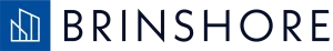 “Logo of Brinshore featuring a minimalist blue icon of buildings beside the company name in blue uppercase letters.”